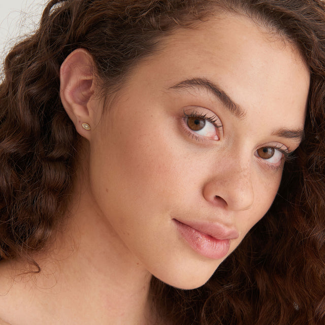 Mother of pearl evil eye stud earrings gold