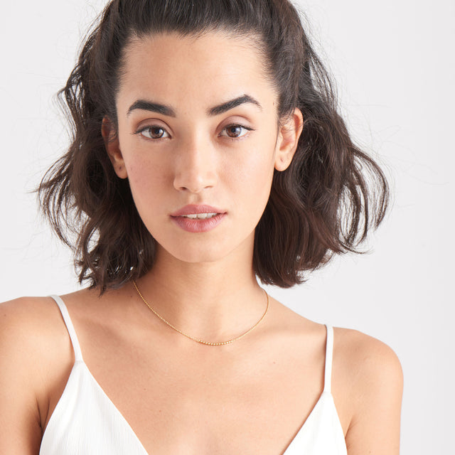 Modern multiple ball necklace gold