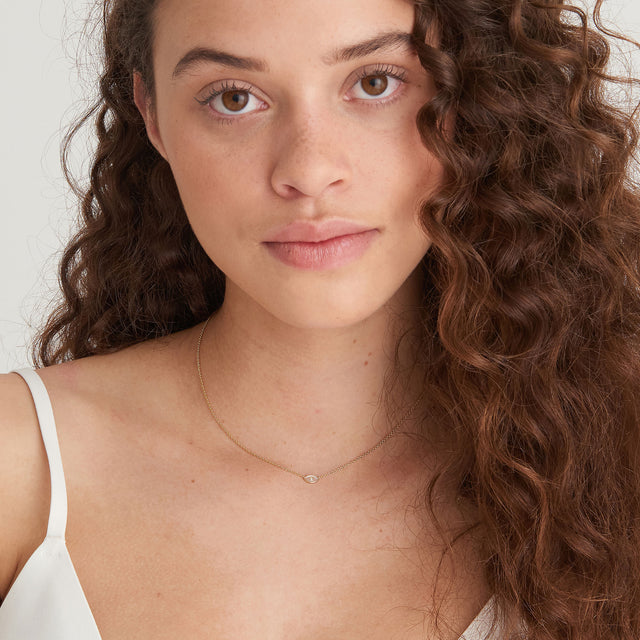 Mother of pearl evil eye necklace gold